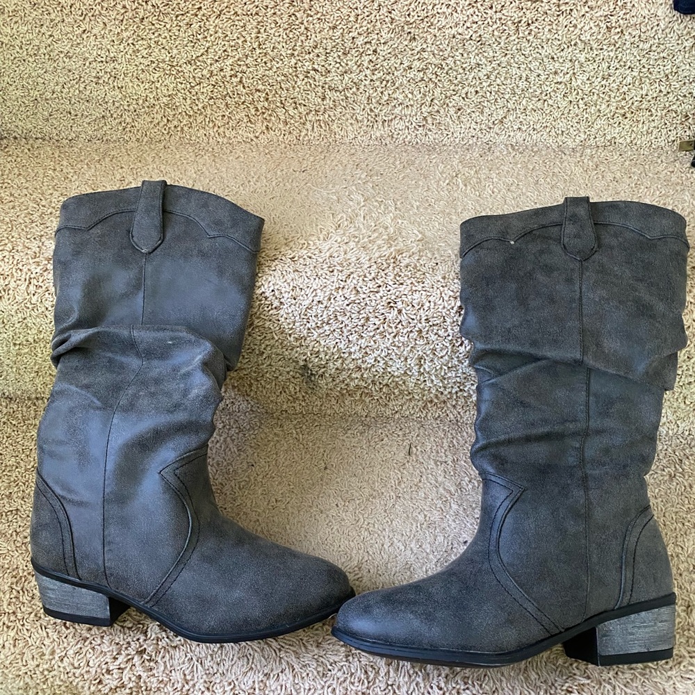 New, never worn knee high boots.